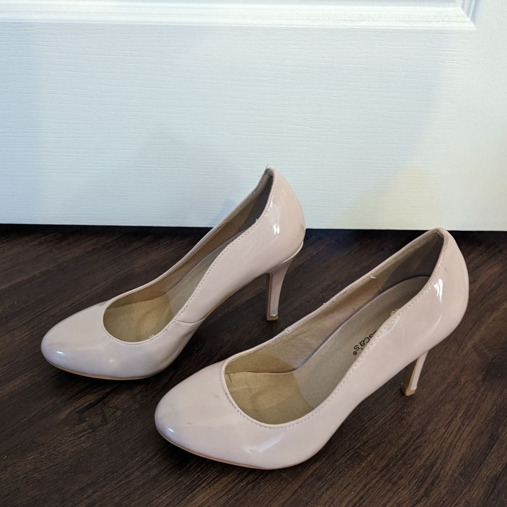 Francesca's pink pumps